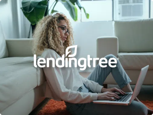 Woman on a laptop with Lending Tree logo