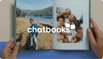Chatbooks logo over a person holding a photo album