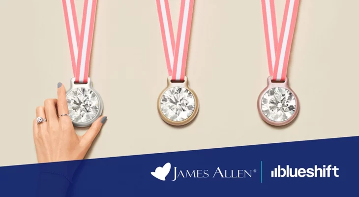 James Allen and Blueshift logos under an image of a woman's hand touching a silver medal alongside gold and bronze medals