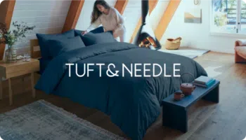 Tuft and Needle logo over an image of a woman making her bed