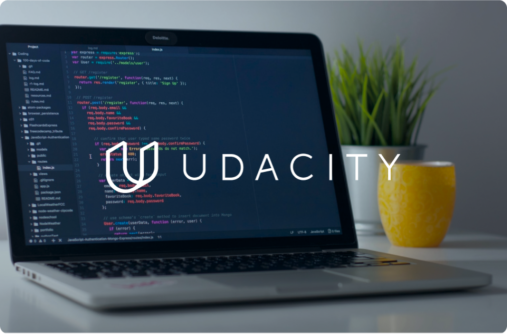 Udacity logo over a laptop with lines of code on the screen