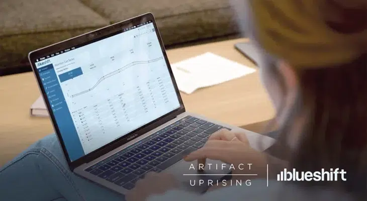 Artifact Uprising and Blueshift logos over a woman on a laptop looking at data