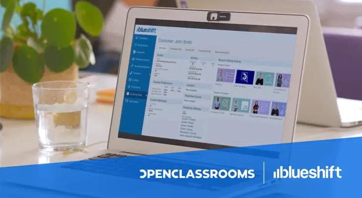 Open Classrooms and Blueshift logos beside a laptop displaying the Blueshift interface