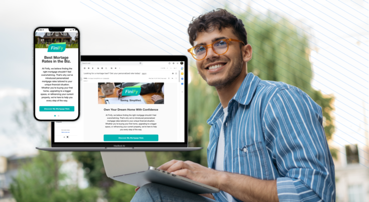 Stock image of a man holding a laptop showing two channels beside him - a web advertisement and an email from a financial company named Finify.