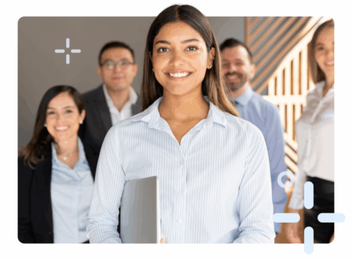Woman standing with a team behind her
