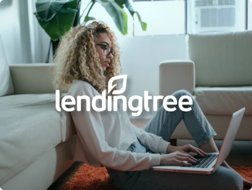 lending tree logo on a background that displays a woman on a laptop